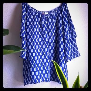 **Sold**Blue and white lightly used top